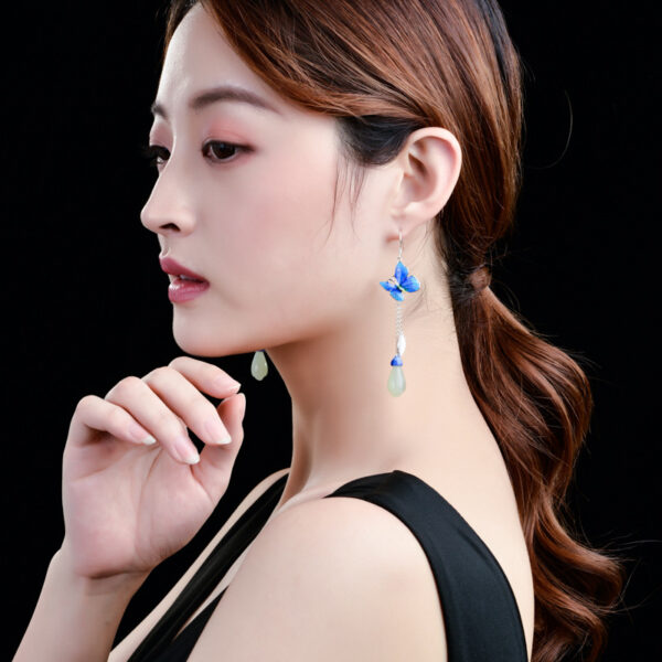 Classical Silver Butterfly Magnolia Earrings - Image 4