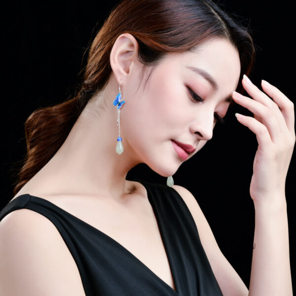 Classical Silver Butterfly Magnolia Earrings - Image 6